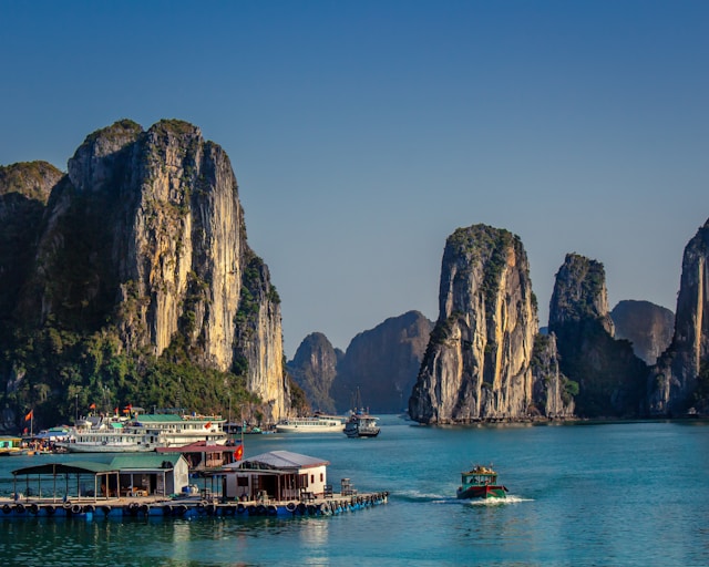 Limestone cliffs rising in Ha Long Bay